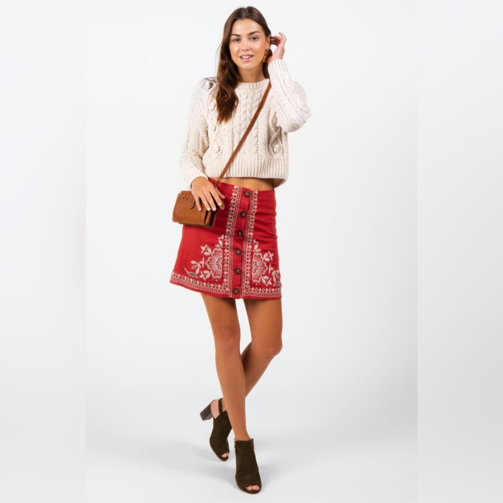 Francesca’s button embroidered mini skirt